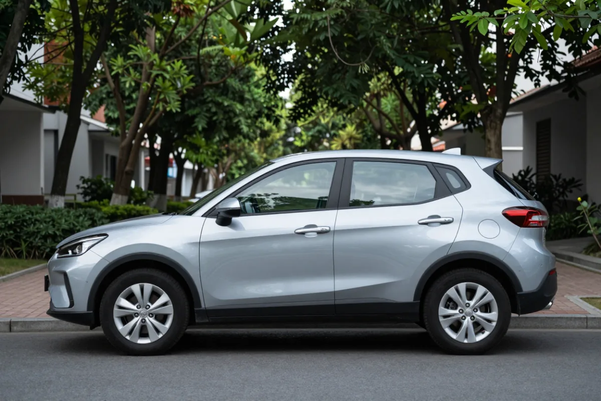 A new car parked on a residential street